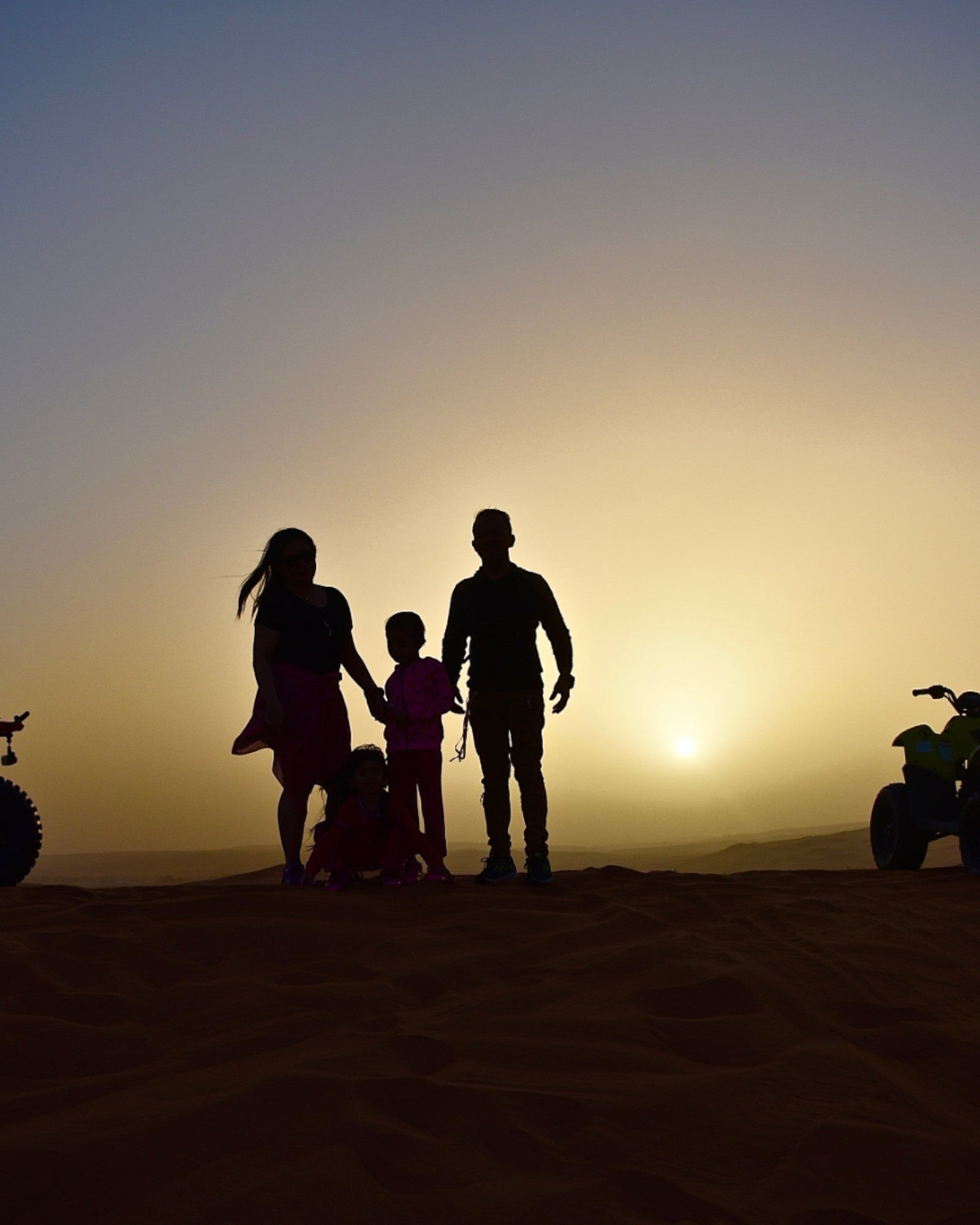 a-family-on-a-sunset-quad-bike-adventure-Photoroom.jpg